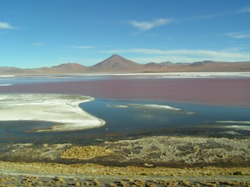 This panoramic vista of Bolivia's famous Uyuni Salt Flats, the largest salt flat in the world, was taken by a marvelous Hungarian photographer, name unknown.